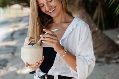 Woman-Enjoying-Coconut-Water-Webstory